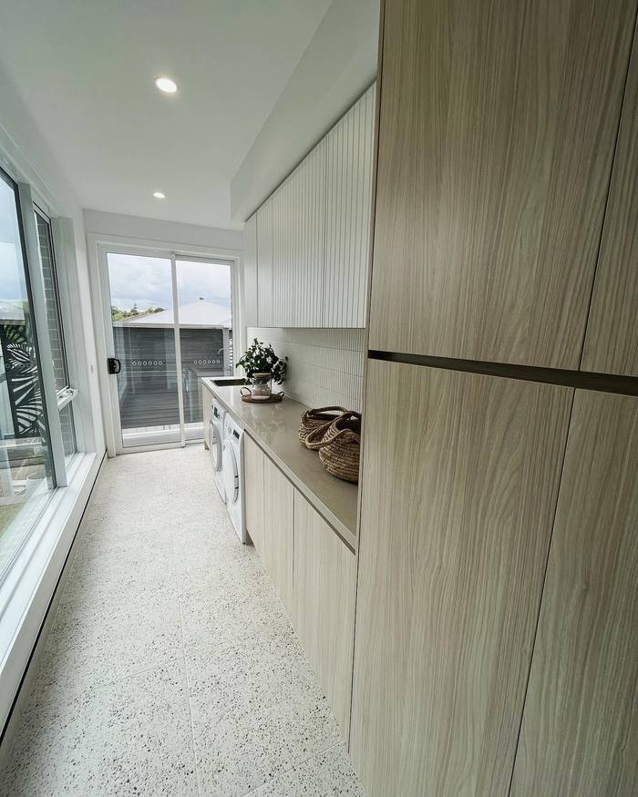 Timber veneer built-in wardrobe and storage cabinetry